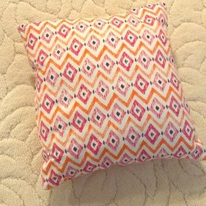 Pink and orange throw pillow